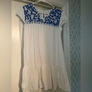 J. Marie embroidery the dress.